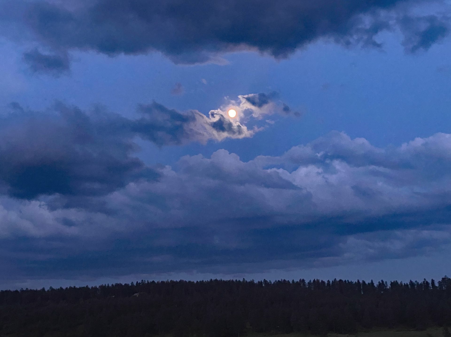 Full Moon hidden by clouds