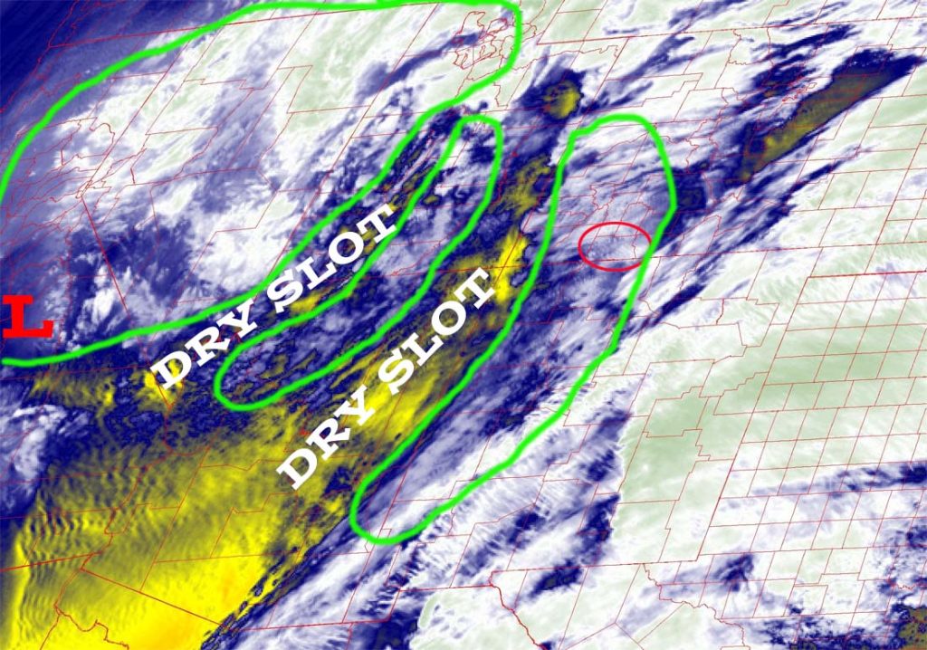 Water vapor satellite around 12:40pm on Thursday – The areas outlined in green are bands of showers moving west. Between each band is a dry slot.