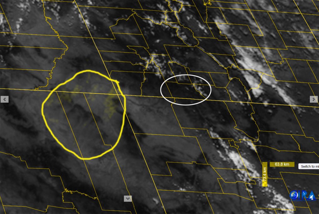 Satellite with dust enhancement around 3:30pm Tuesday – Light dust is being kicked up in the area outlined in yellow. The dust is moving towards the northeast.