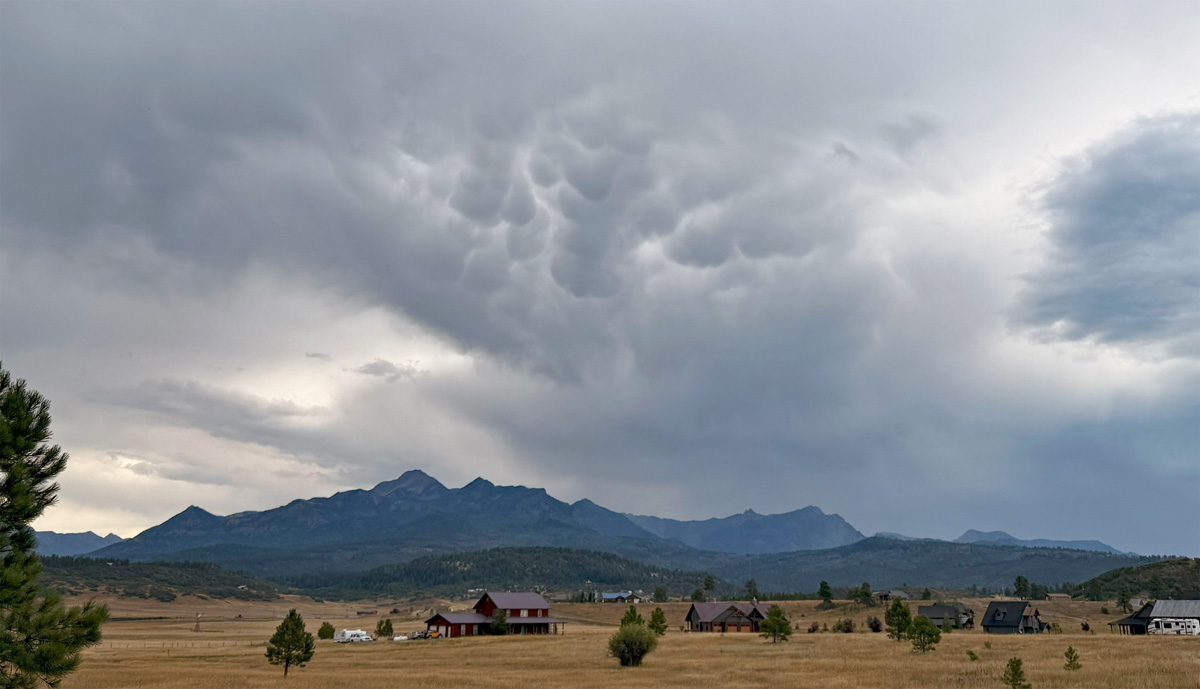Mammatus clouds are a sign of instability and often associated strong thunderstorms. Unfortunately our clouds have been more bark than bite. – Pic taken 8/22/2025