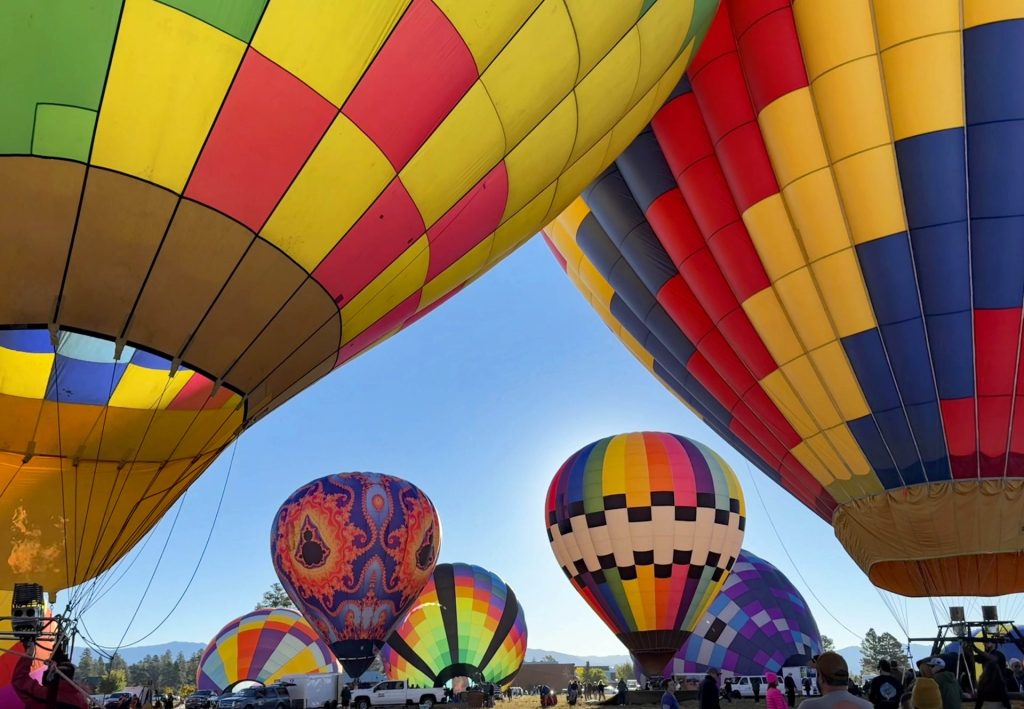 Pagosa Weather Report: September ’26 Newsletter! 9 Balloons being blown up