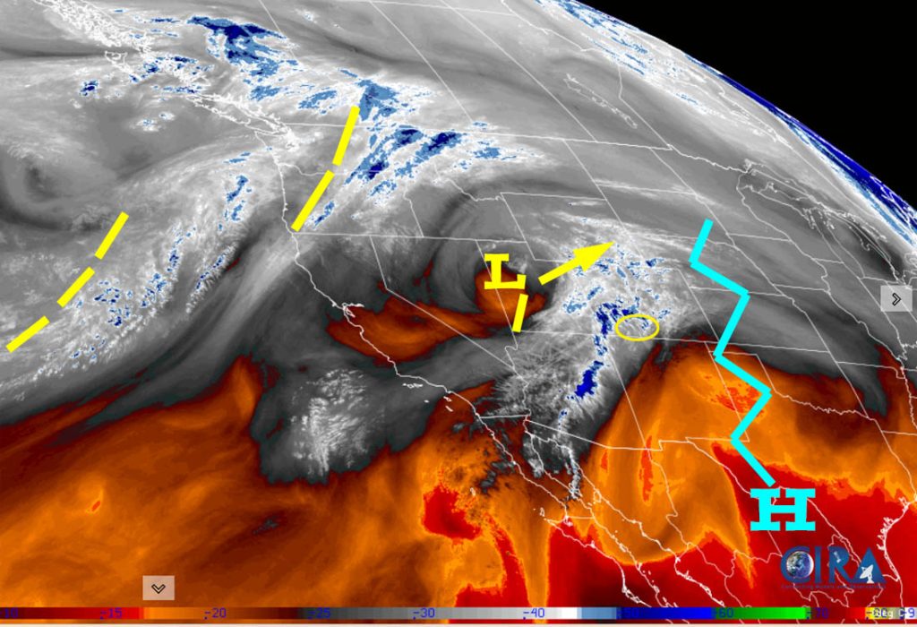 Water vapor satellite Monday afternoon – The ridge, jagged blue line, has pushed to our east but is still forcing systems to our north. The weak low over UT will move northeast today and give us a few more clouds and gustier afternoon winds. The real action continues to be over Pacific NW.